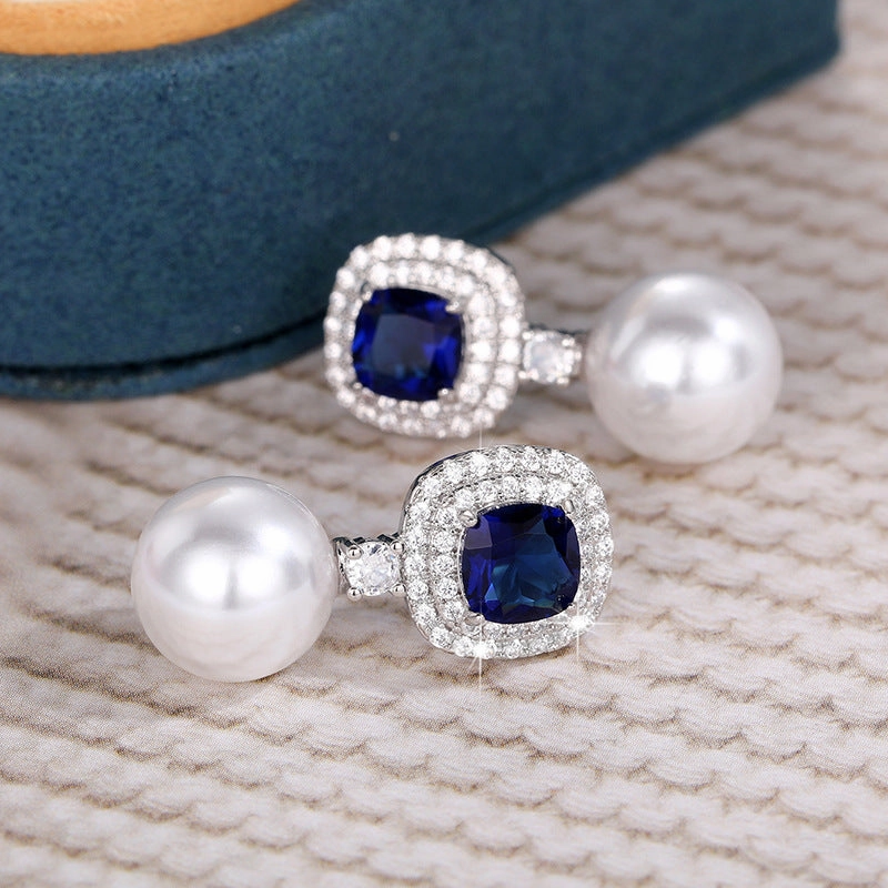 Wholesale Imitation Pearl Inlaid Blue Zircon Earrings