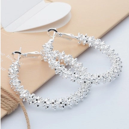 Wholesale Irregular Pimple Circle Alloy Earrings
