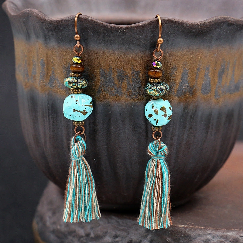 Wholesale Leaf Pendant Hollow Carved Alloy Tassel Earrings