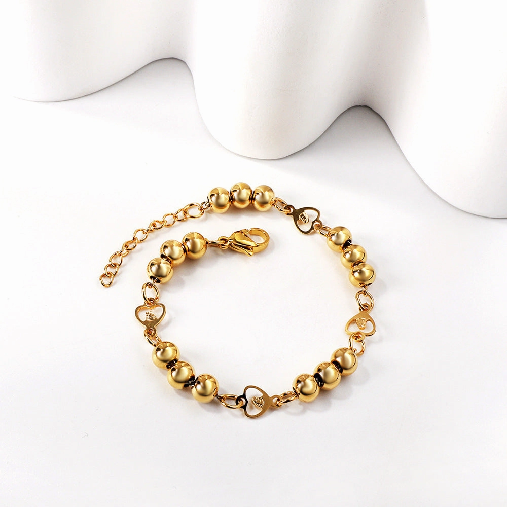 Wholesale Love Cross Oval Gradual Gold Figure Steel Ball Geometry Titanium Steel Bracelet