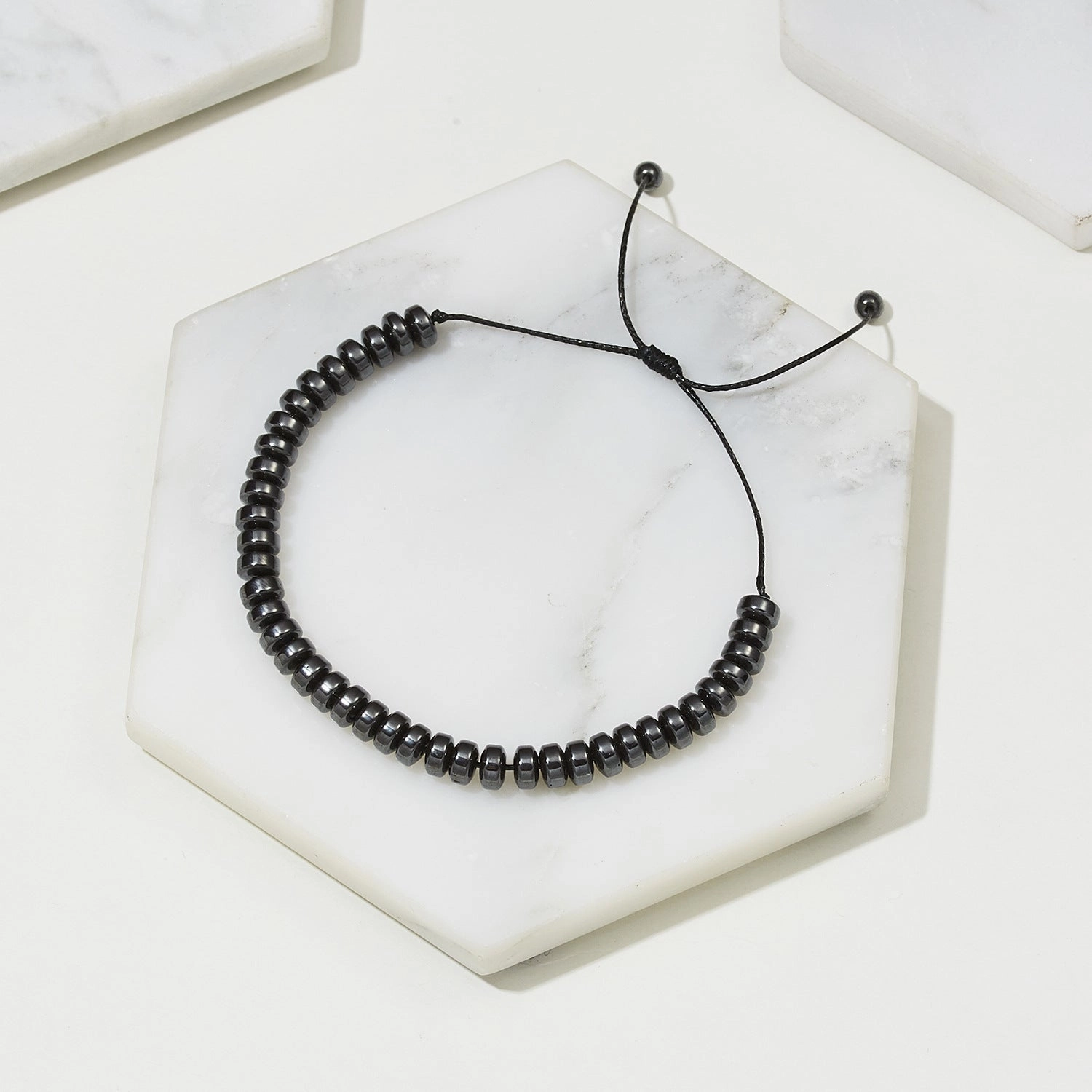 Wholesale Love flat bead black gallstone hand-woven adjustable bracelet