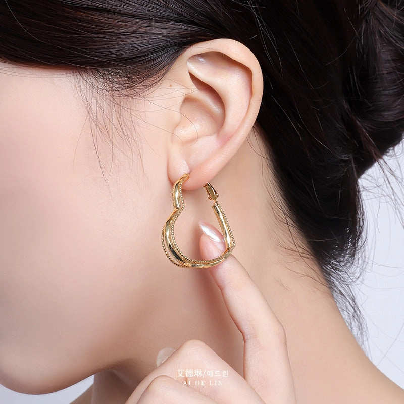 Wholesale Love Hollow Copper Earrings