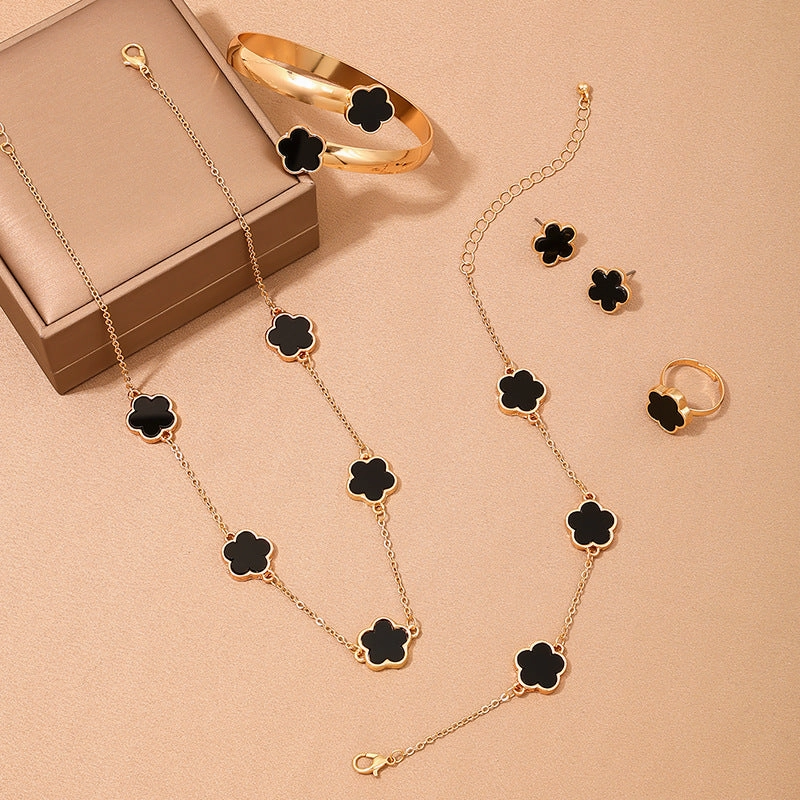 Wholesale Metal New Five Leaf Clover Flower Bracelet Necklace Earrings Ring Jewelry suit