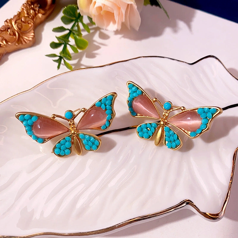 Wholesale Middle Antique Glazed Butterfly Diamond Dumb Gold Alloy Earrings