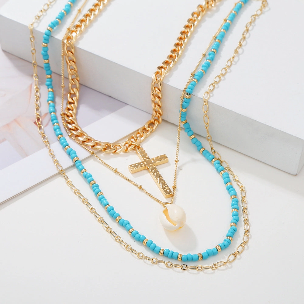Wholesale Multi-Layered Demi Beads Shell Cross Necklace