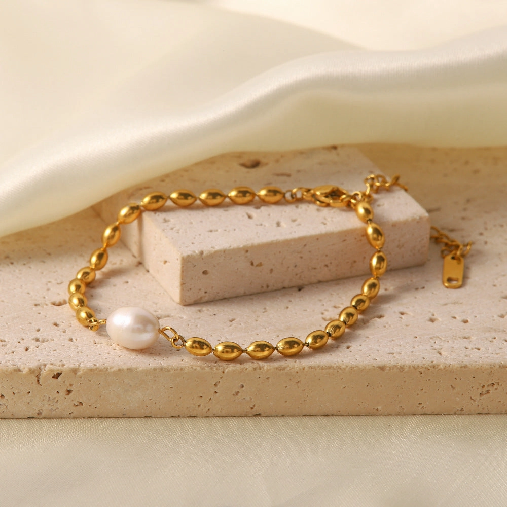 Wholesale Natural Freshwater Pearl Oval Golden Peas Titanium Steel Bracelet