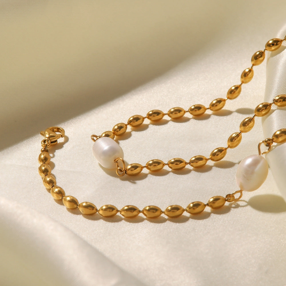 Wholesale Natural Freshwater Pearl Oval Golden Peas Titanium Steel Bracelet
