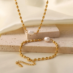 Wholesale Natural Freshwater Pearl Oval Golden Peas Titanium Steel Bracelet
