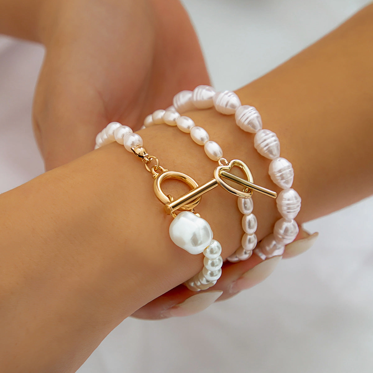 Wholesale of Multi-layer Rice Shaped Pearl Necklaces