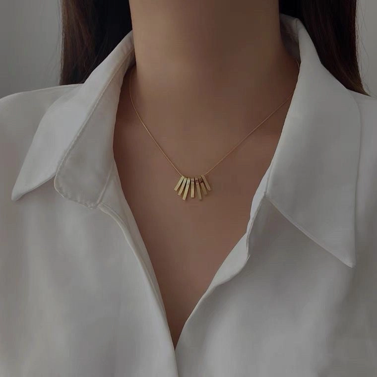 Wholesale of New Minimalist Fan Shaped Light Gold Collarbone Titanium Steel Necklace