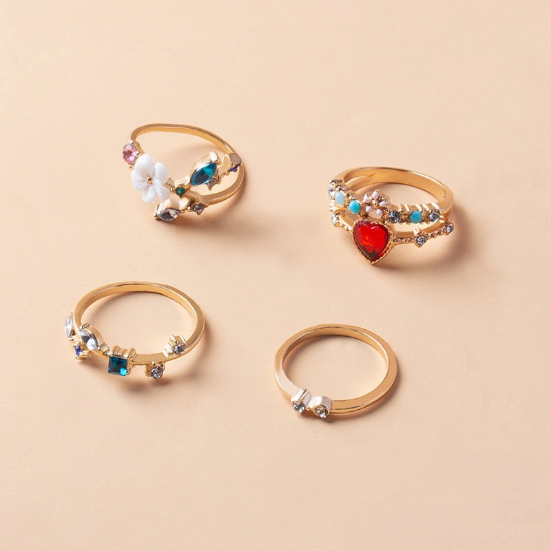 Wholesale Opening Gold-plated Flower 4-piece Metal Ring Set