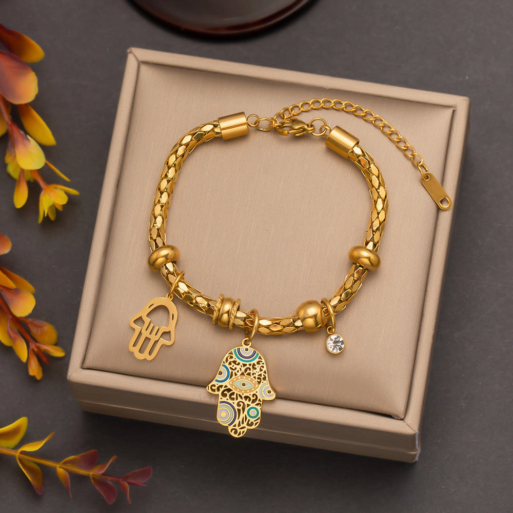 Wholesale Palm Eyes Flower Thick Titanium Steel Bracelet