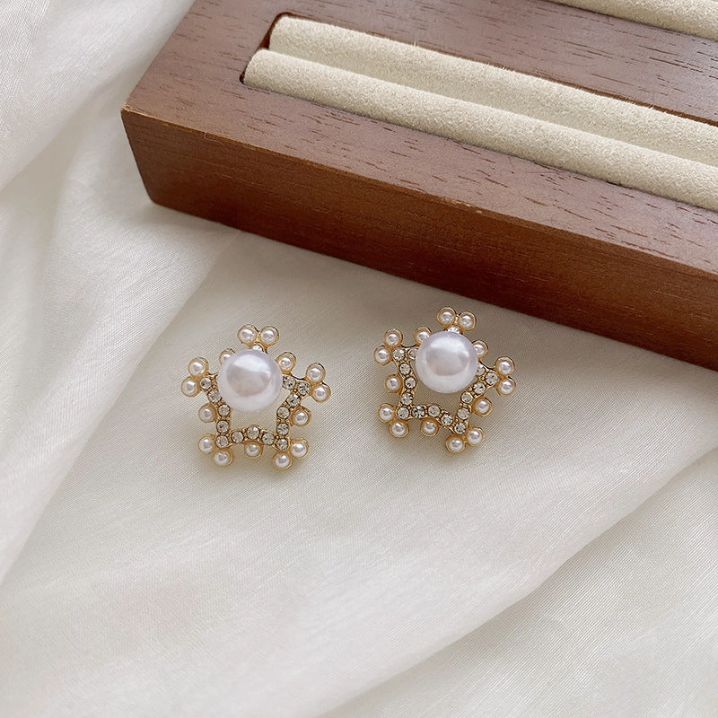 Wholesale pearl five-pointed star diamond earrings
