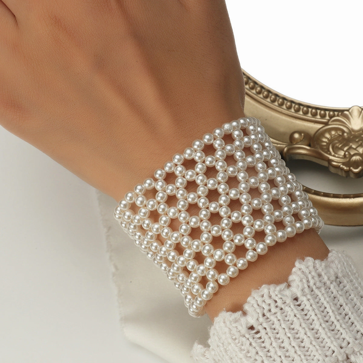 Wholesale Personalized Hollow Out Elastic Pearl Imitation Hand Woven Bracelets