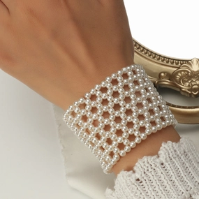 Wholesale Personalized Hollow Out Elastic Pearl Imitation Hand Woven Bracelets