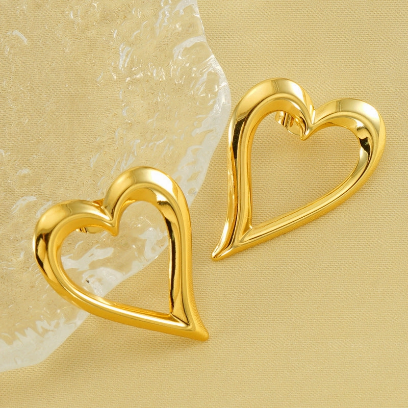 Wholesale plated 18K hollow heart earrings