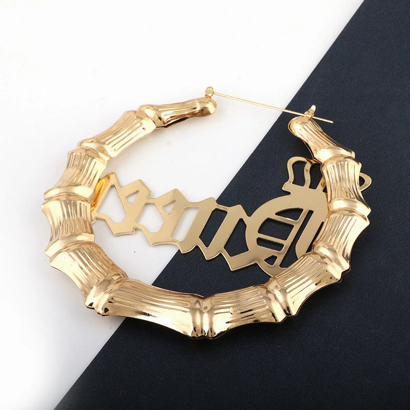Wholesale Punk English Alphabet Queen Slub Round Metal Earrings