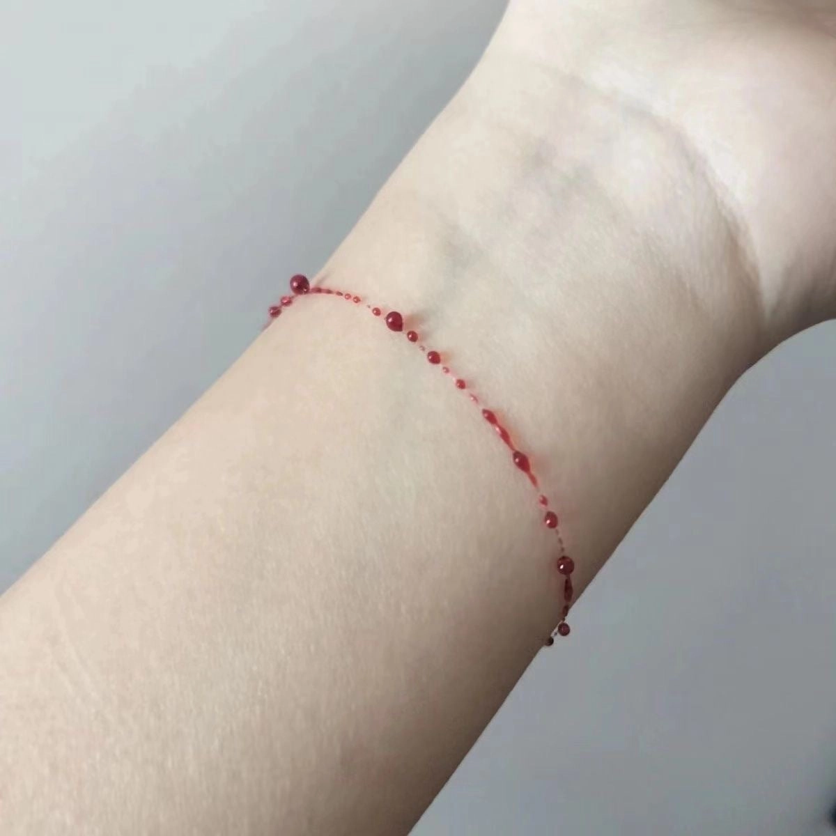 Wholesale Red Blood Drop Creative Cross Superfine Bracelet