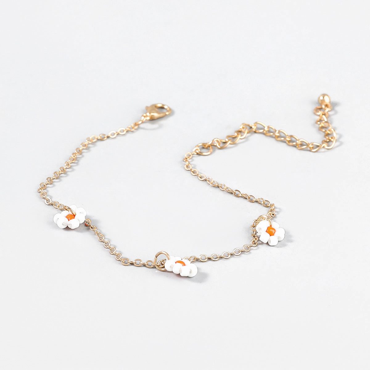 Wholesale Rice Beads Weaving Simple Flower Alloy Bracelet