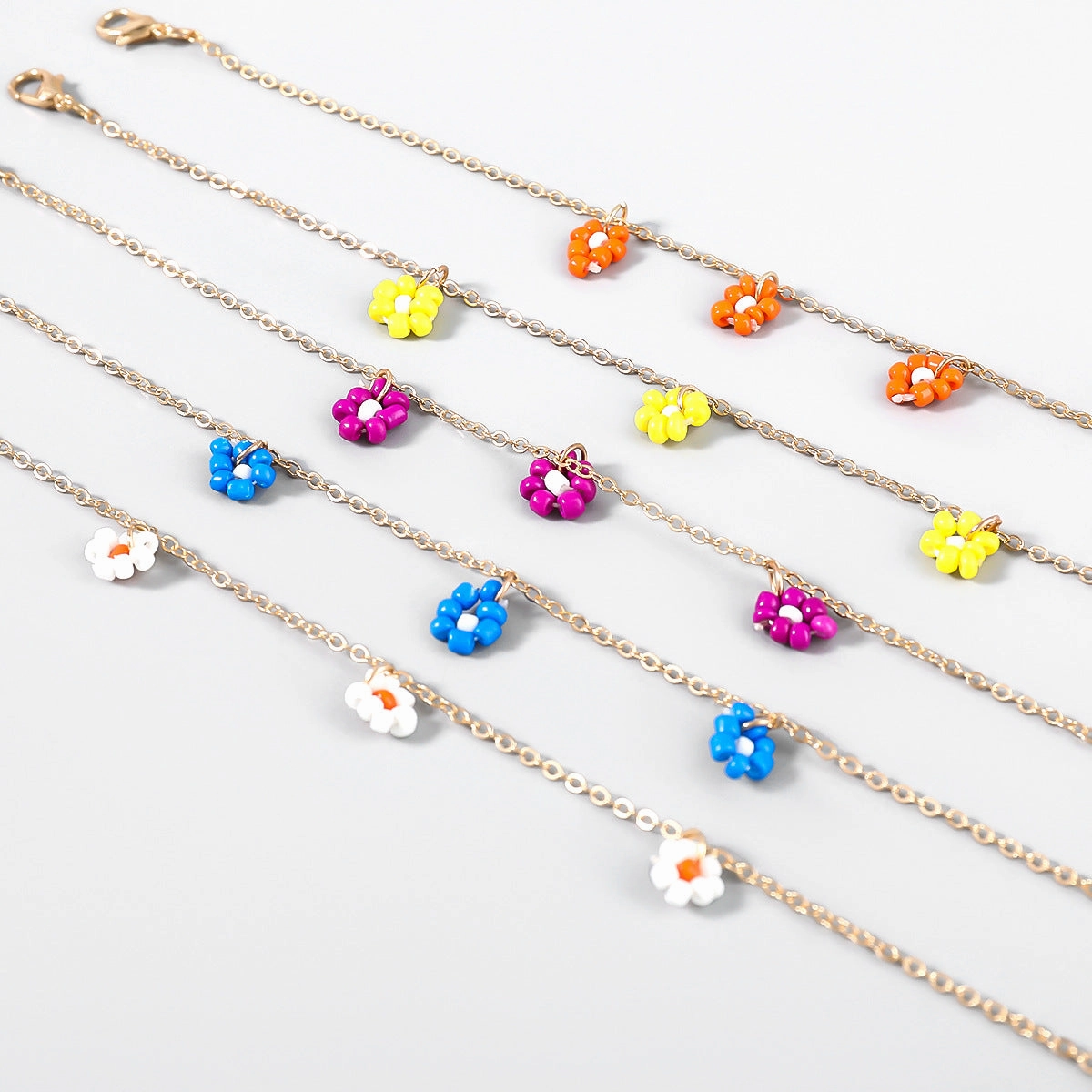 Wholesale Rice Beads Weaving Simple Flower Alloy Bracelet