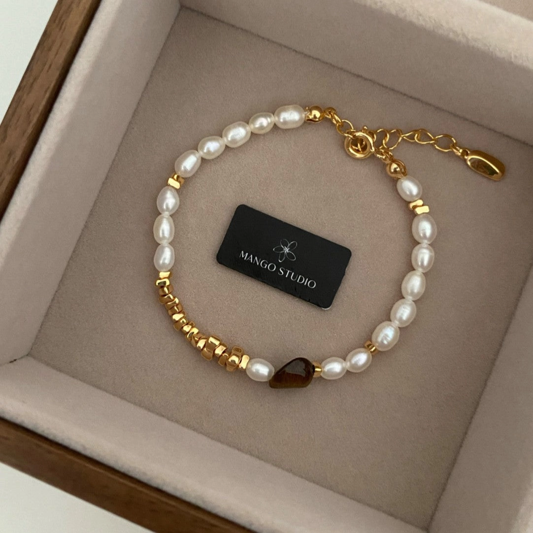 Wholesale Rice-grain pearl tiger eye stone small fresh and high-end adjustable bracelet