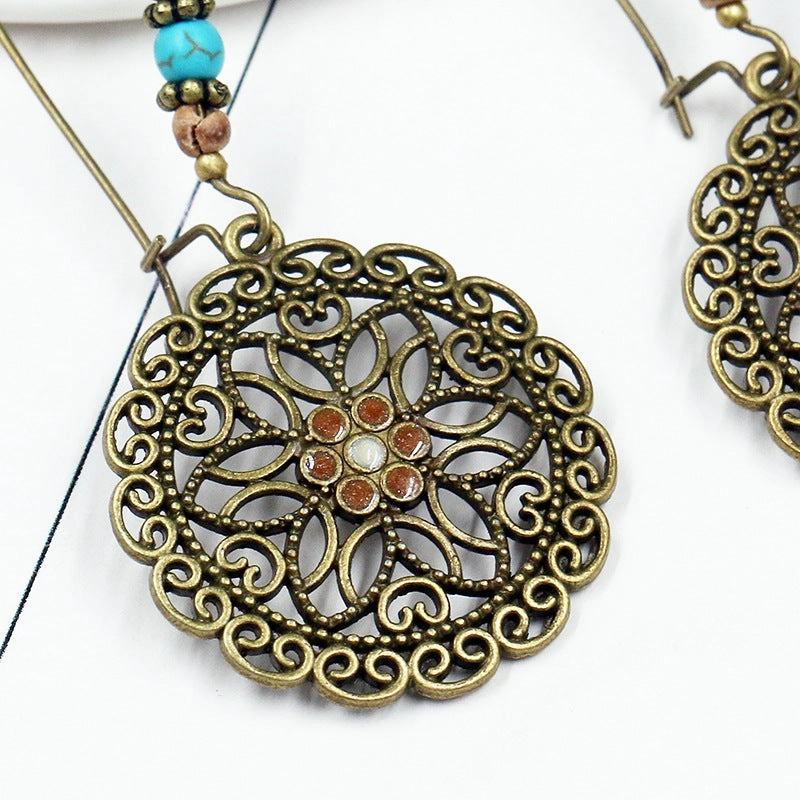 Wholesale Round Hollow Flowers Alloy Earrings