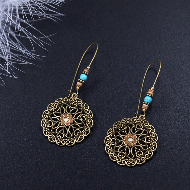 Wholesale Round Hollow Flowers Alloy Earrings