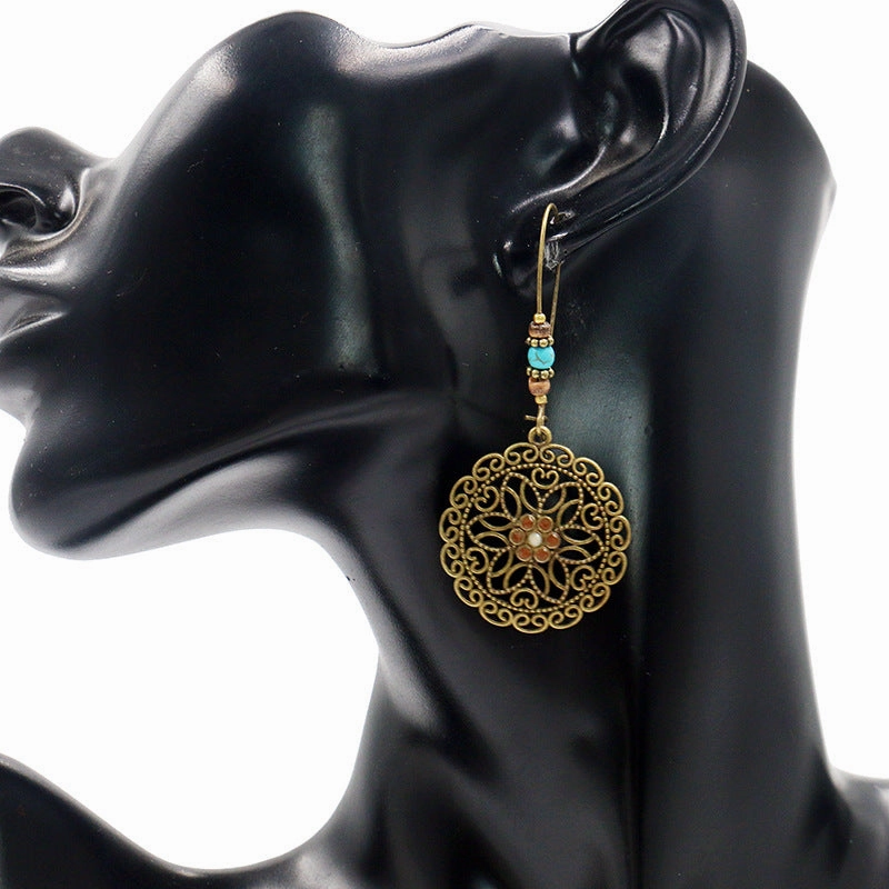Wholesale Round Hollow Flowers Alloy Earrings