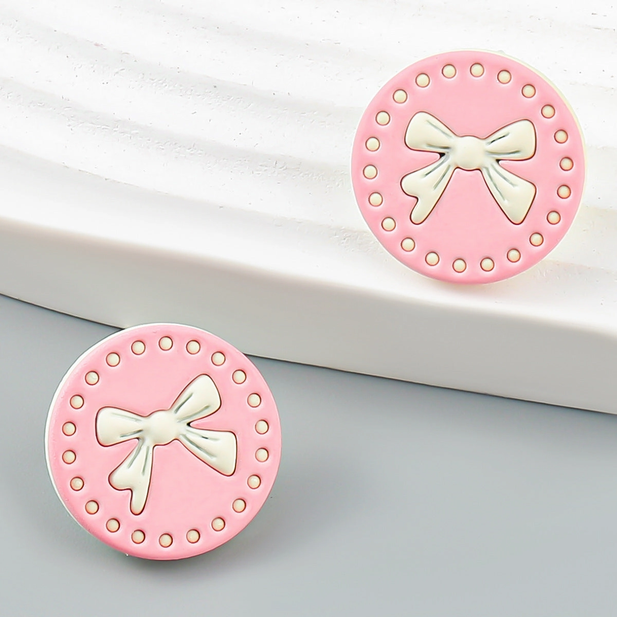 Wholesale Round Spray Painted Bow Alloy Ear Studs