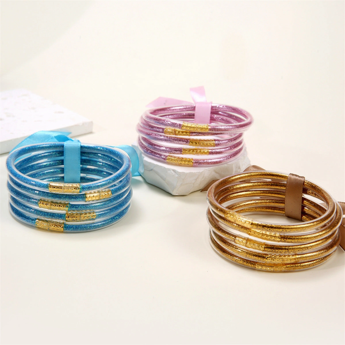 Wholesale Soft Transparent Silicone Gold Dust Shiny Plastic Tube Bracelet