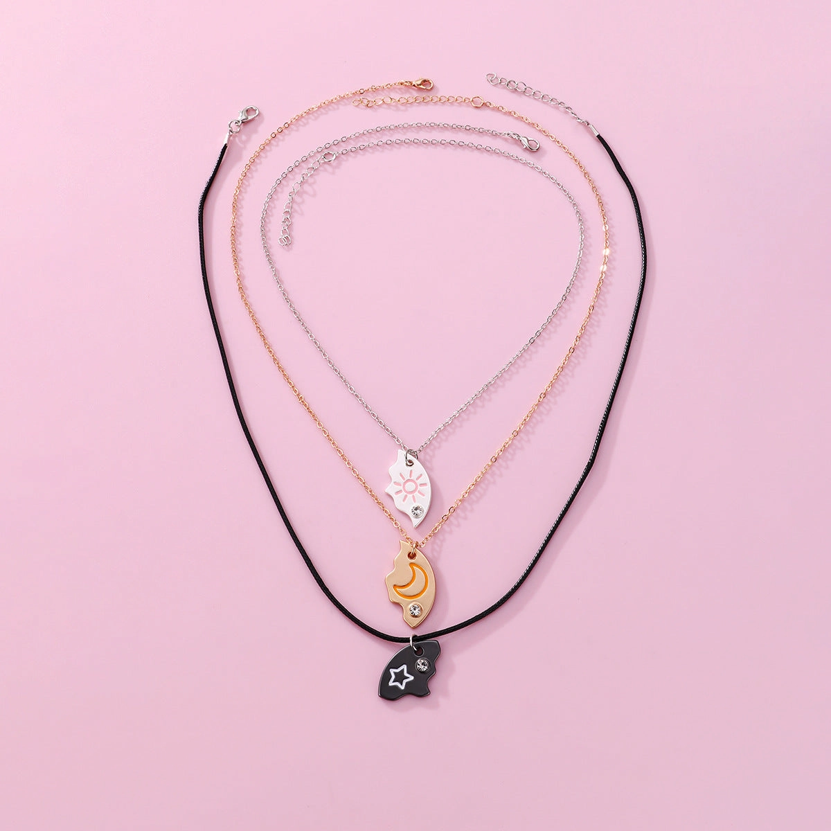Wholesale Star and Moon Trio Alloy Dripping Oil Stitching Round Pendant Necklace Set