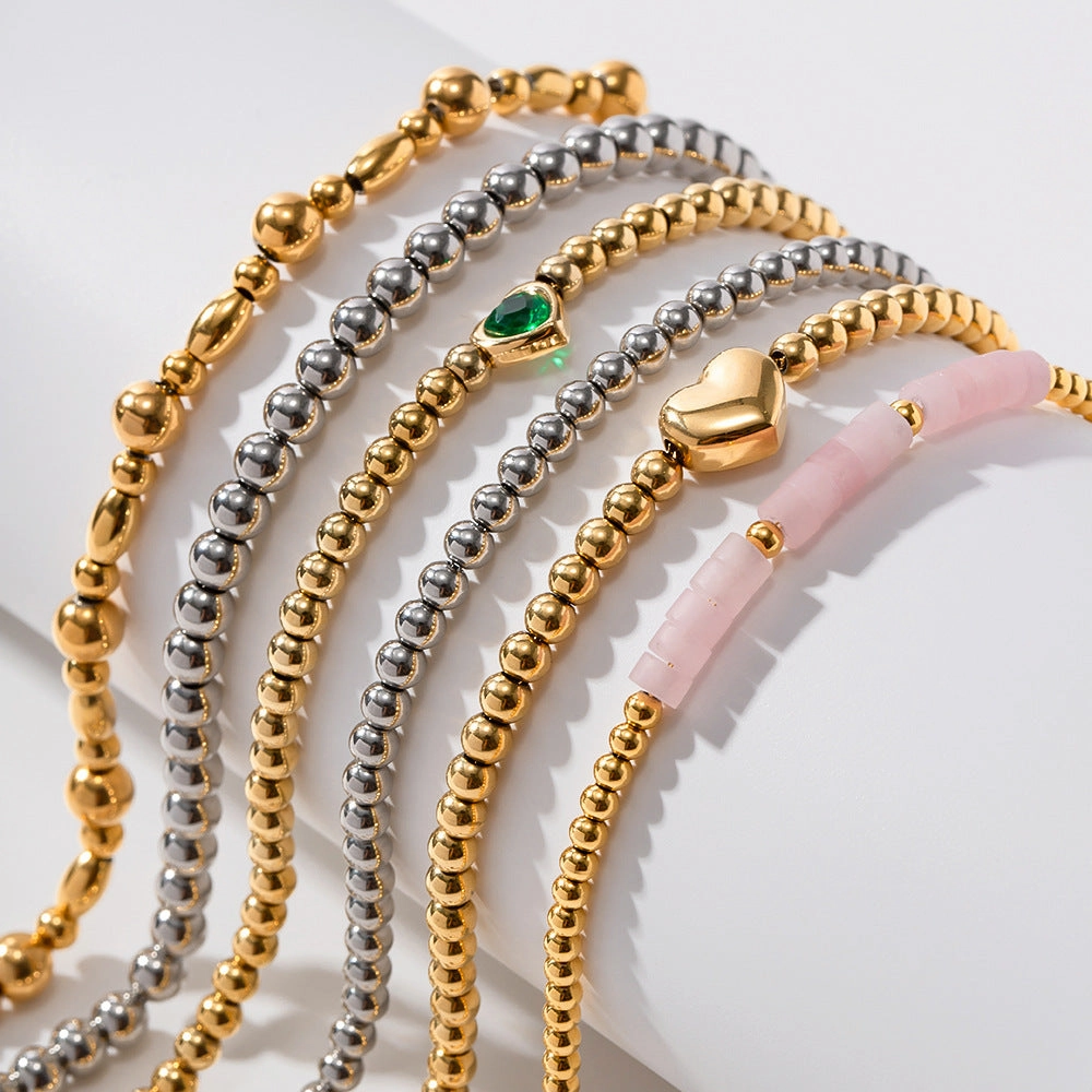 Wholesale Titanium Steel 16k Gold Bead Green Heart Zircon Bracelet