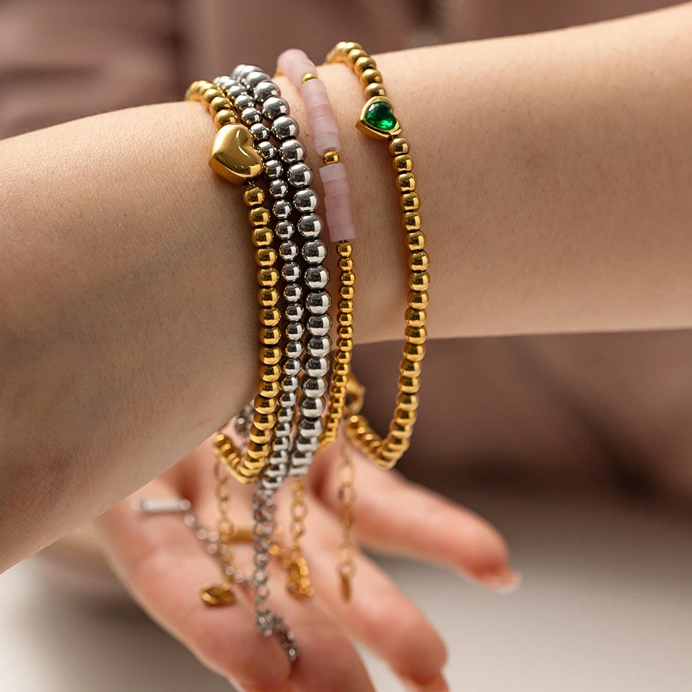 Wholesale Titanium Steel 16k Gold Bead Green Heart Zircon Bracelet