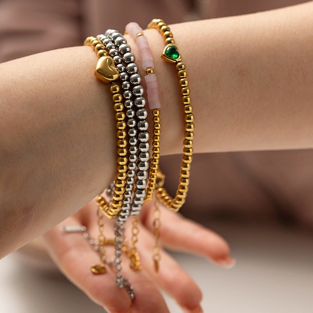 Wholesale Titanium Steel 16k Gold Bead Green Heart Zircon Bracelet