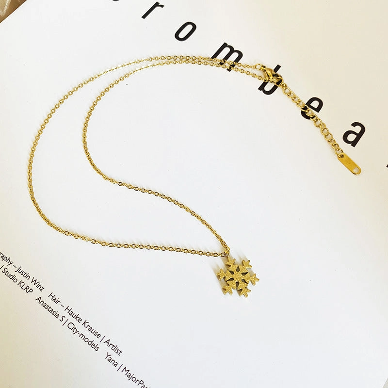 Wholesale Titanium Steel Color Gold Frosted Small Snowflake Necklace