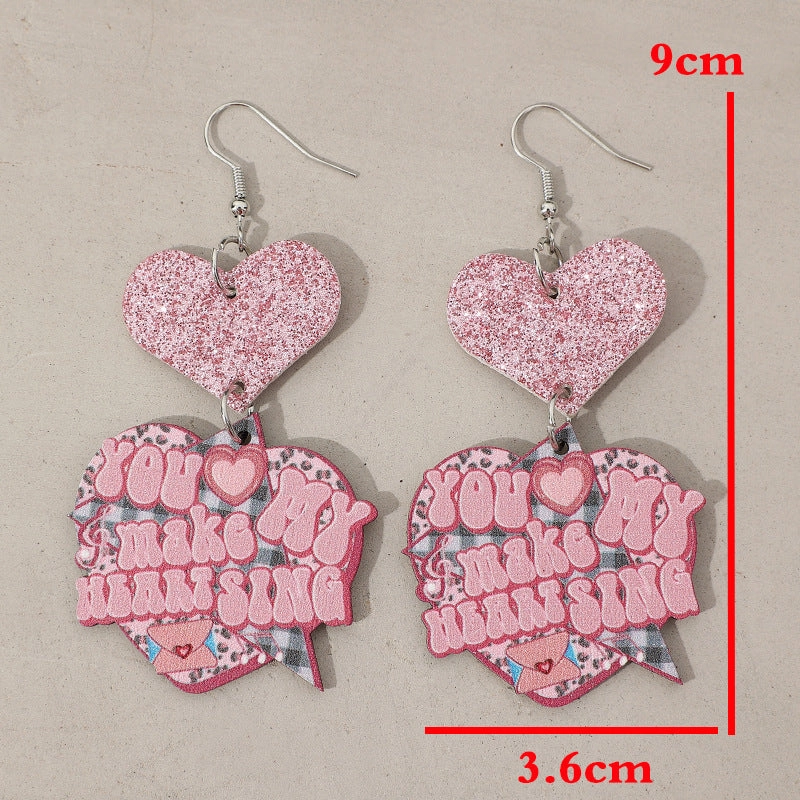 Wholesale Valentine's Day Cartoon Pink Glitter Heart Hanging Letter Leather Earrings