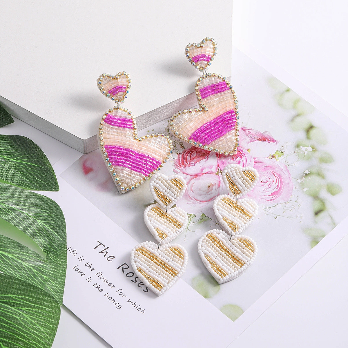 Wholesale Valentine's Day Pink Rice Pearl Knitted Love LOVE Earrings