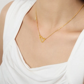 Wholesale Valentine's Day Titanium Steel 18k Gold Asymmetric Hollow Heart Pendant Necklace