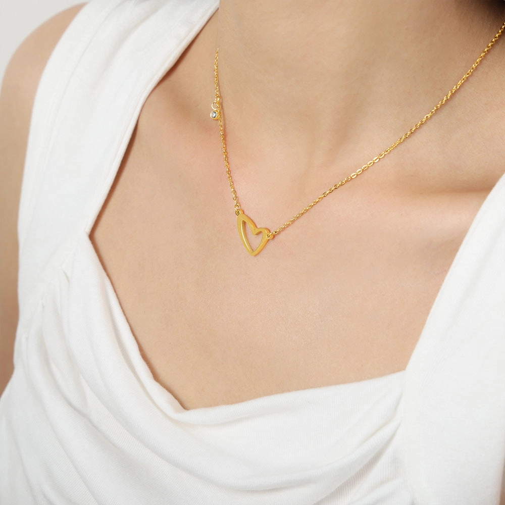 Wholesale Valentine's Day Titanium Steel 18k Gold Asymmetric Hollow Heart Pendant Necklace