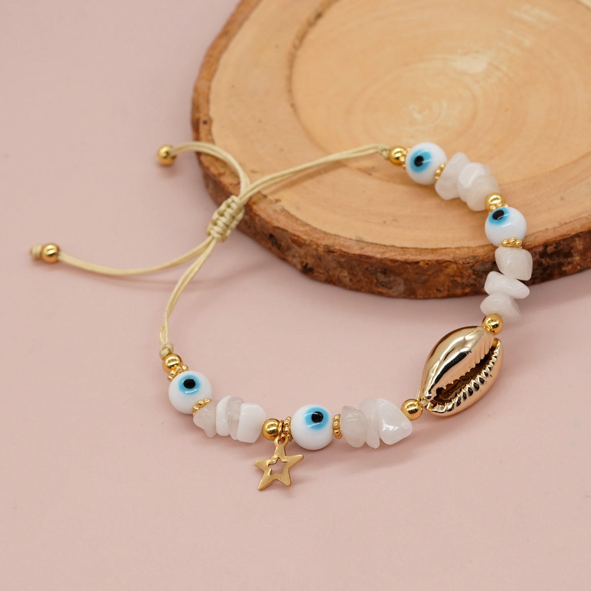 Wholesale White Glass Eyes Gold Snowflake White Jade Gold Seashell Bracelet