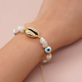 Wholesale White Glass Eyes Gold Snowflake White Jade Gold Seashell Bracelet