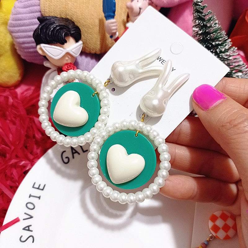 Wholesale Wholesale S925 curved candy beads pearl rabbit girlish cartoon silver earrings