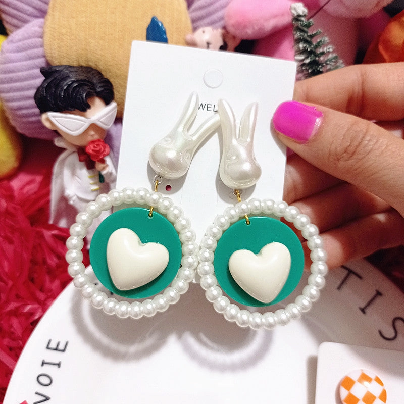 Wholesale Wholesale S925 curved candy beads pearl rabbit girlish cartoon silver earrings