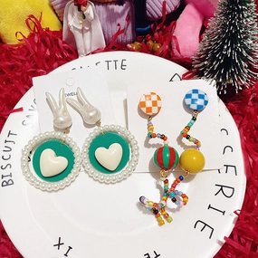 Wholesale Wholesale S925 curved candy beads pearl rabbit girlish cartoon silver earrings