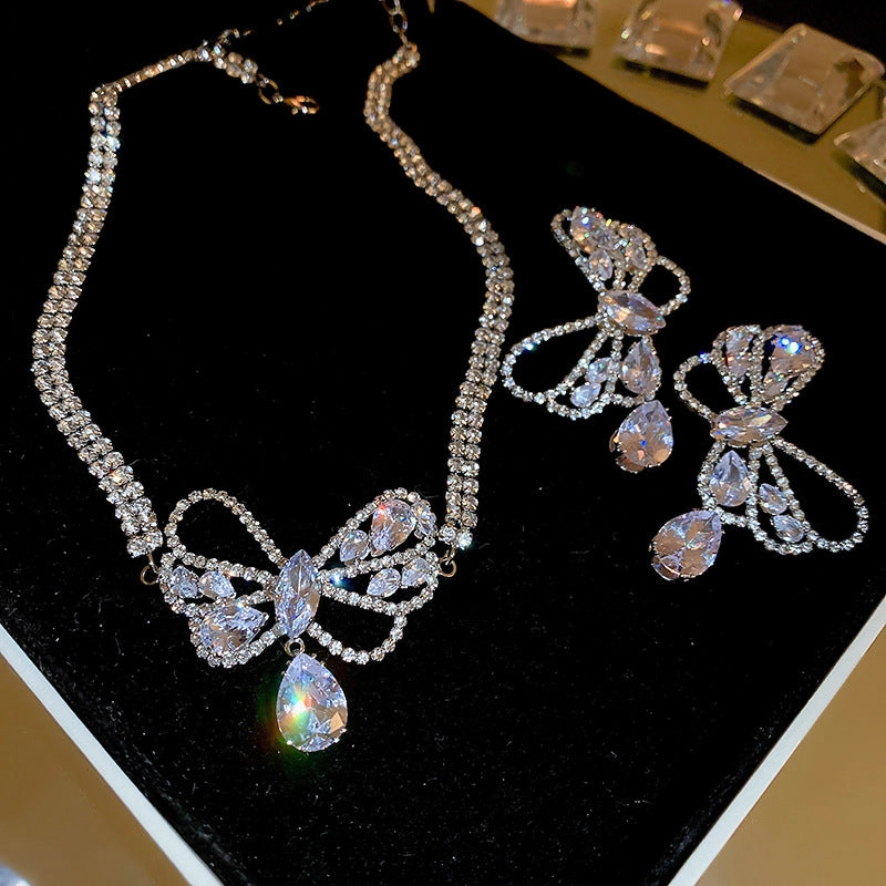 Wholesale Zircon Hollow Bow Teardrop Earrings Necklace Set